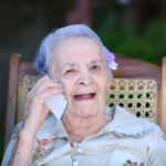grandma-phone-talking-smiling-69121201