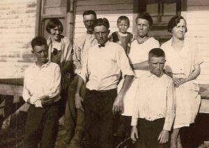 JHA Jim Adams Family L to R- Virgil Edith Jim Luther Bonnie Susie Clifford Mary around 1923