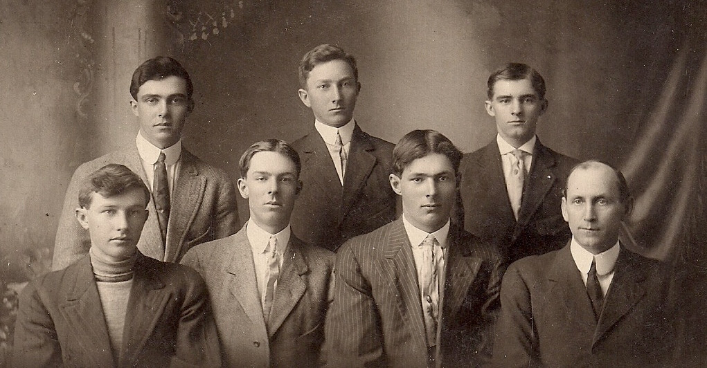 Harvey 1912 Basketball team Glen Harvey bottom front left